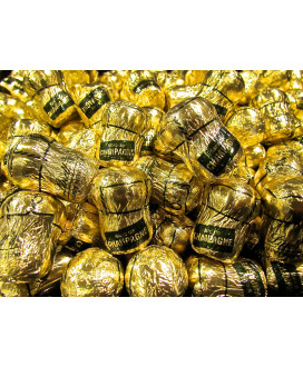 Vendita online cioccolatini a forma di Tappo di Champagne al cioccolato fondente Lindt con ripieno al Marc de Champagne. Shop on