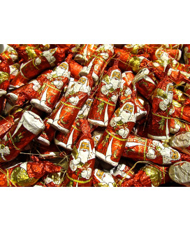 Vendita online appendini per albero di Natale e fermapacco di cioccolato Lindt a forma di angioletto e babbo natale. Shop on lin